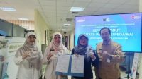 Lepas sambut Kepala Bidang Kesehatan Masyarakat (Kesmas) Dinkes Kota Depok, Indriati menggantikan Zakiah. (dok. Dinkes Depok).