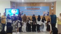 Direktur RSUD KiSA Depok, Agus Gojali beserta jajarannya, usai memberikan santunan kepada anak yatim di Aula Gedung C Lantai 4 RSUD KiSA. (dok. Narasumber)